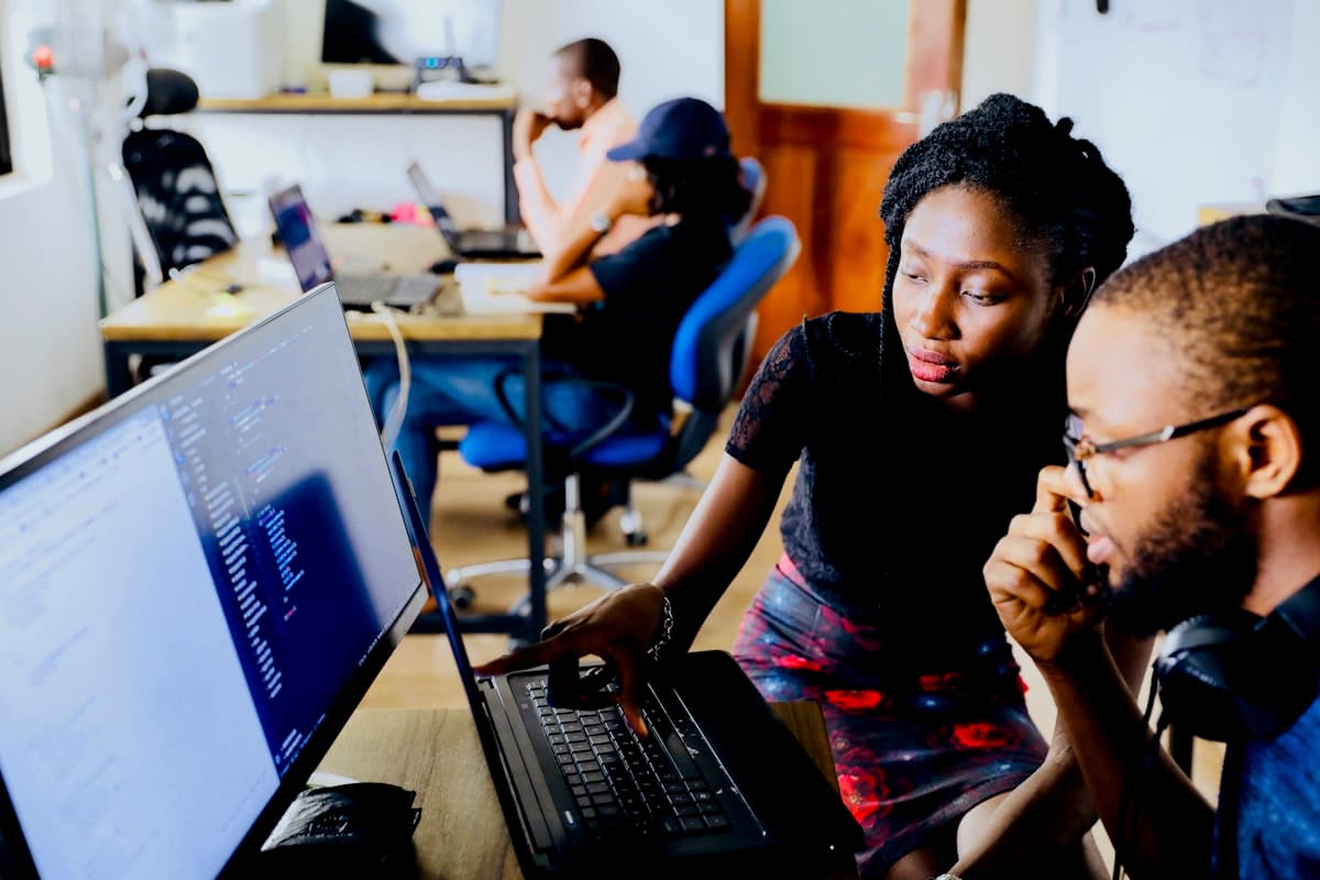 African professionals collaborating in a workplace setting
