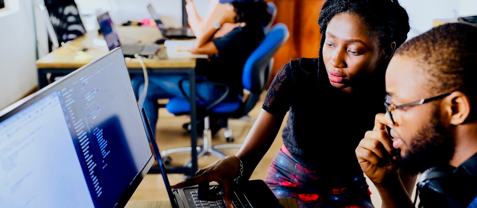 African professionals collaborating in a modern workplace