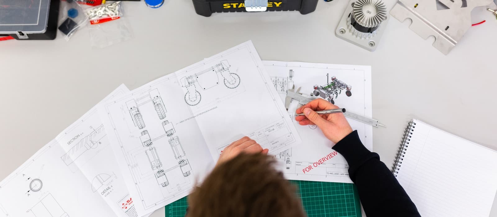 Workplace safety professional inspecting an industrial environment